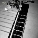 preparazione della chitarra in a blink of the evanescent smile ©Elena Rykova